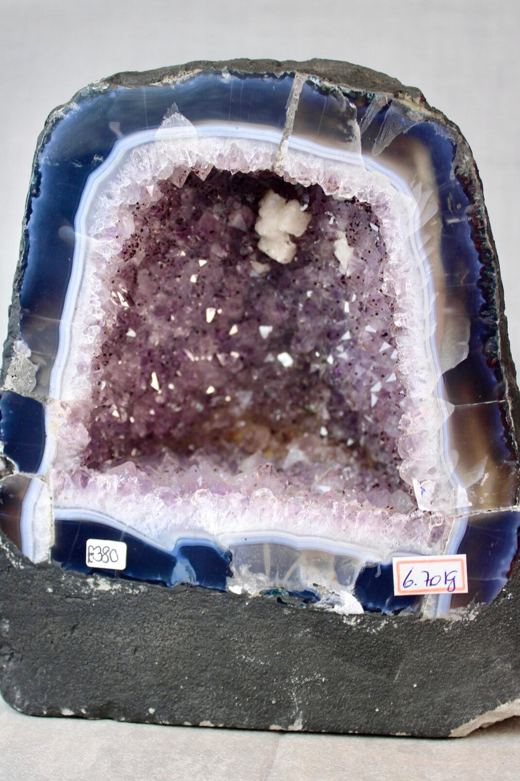 Large amethyst cathedral with agate banding and sugar druzy, cubic calcite - 6.7kg - slight damage in corner but can be painted