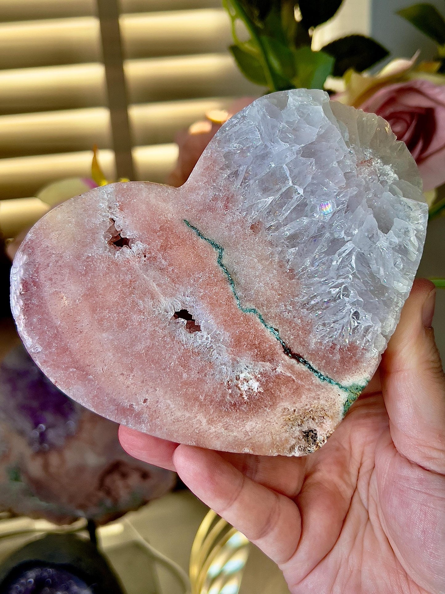 High quality, peach toned, pink amethyst heart with incredible quartz full of rainbows & green jasper vein, on gold stand 766g