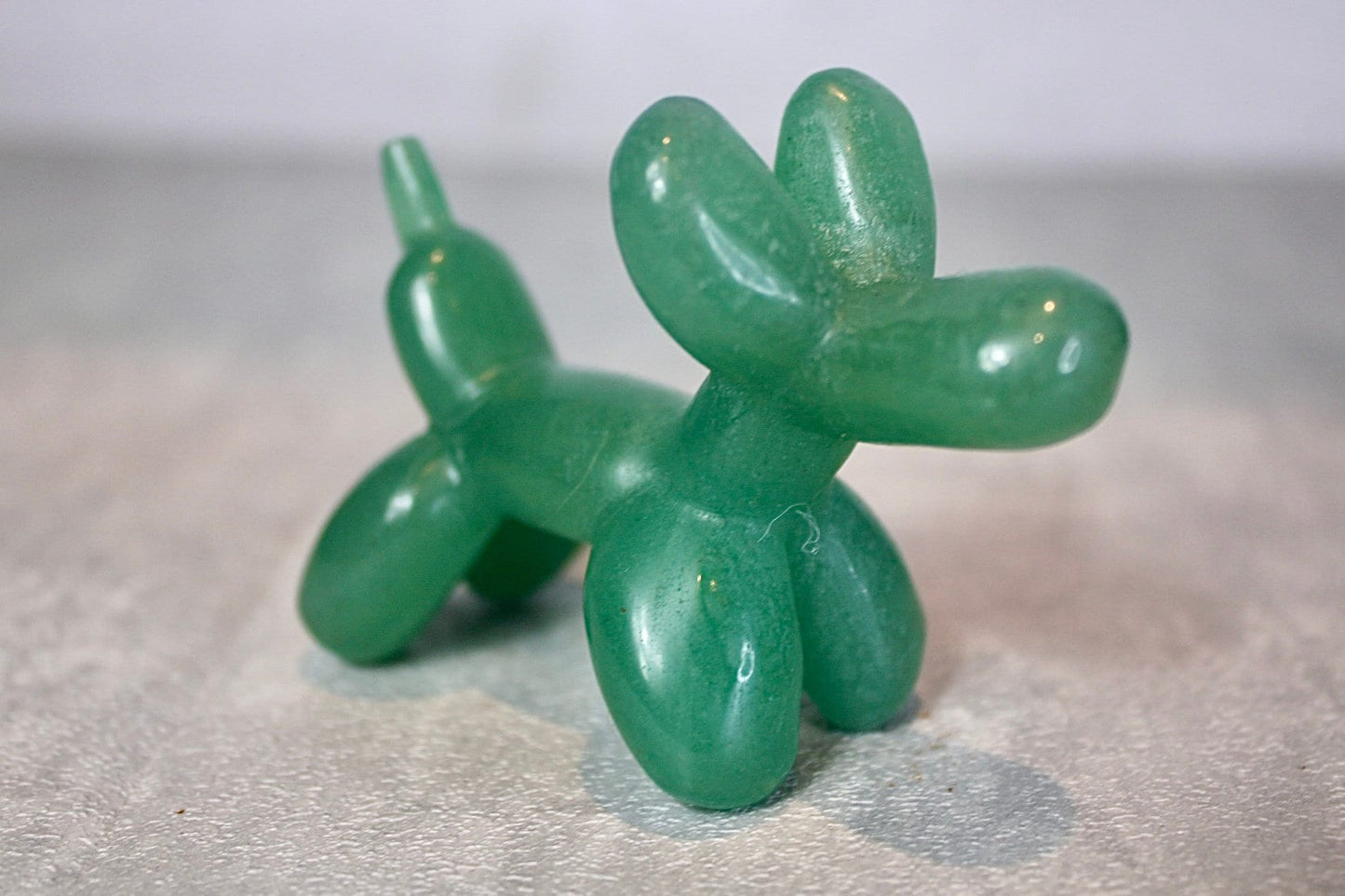 Green, strawberry quartz, balloon dog, carving 5.5 (h) 8cm (L)