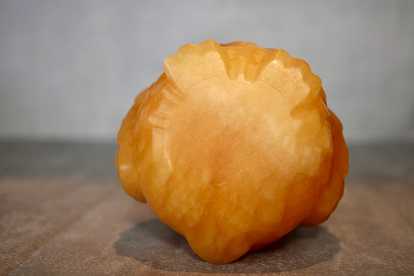 Large, orange calcite, owl carving 10cm(h) 8cm(w)