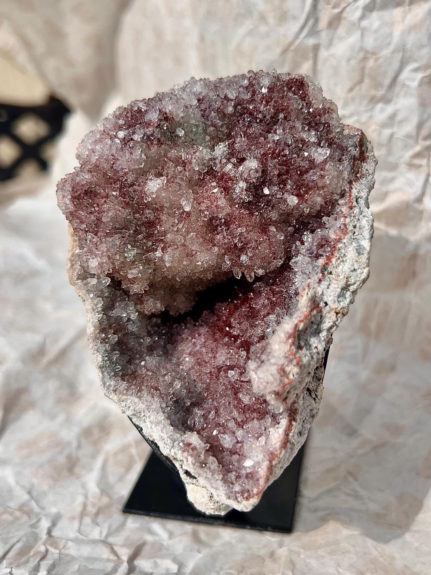high grade, pink amethyst geode with red and pink toned sugar druzy stand