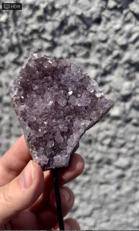 amethyst cluster on stand