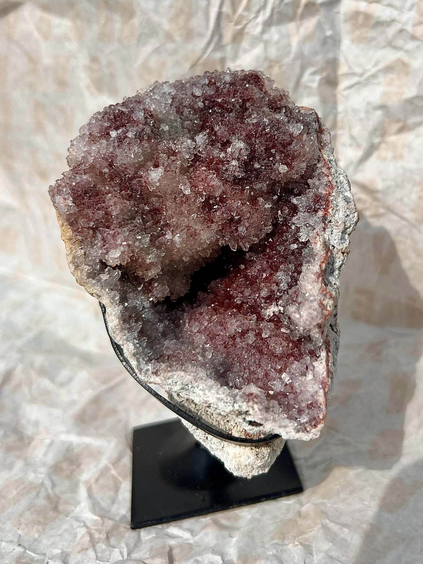 high grade, pink amethyst geode with red and pink toned sugar druzy stand