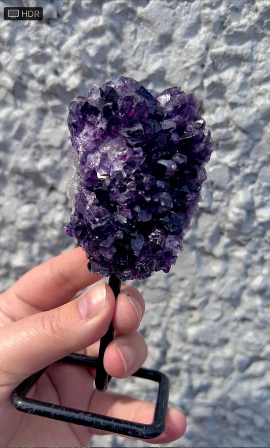 amethyst cluster on stand