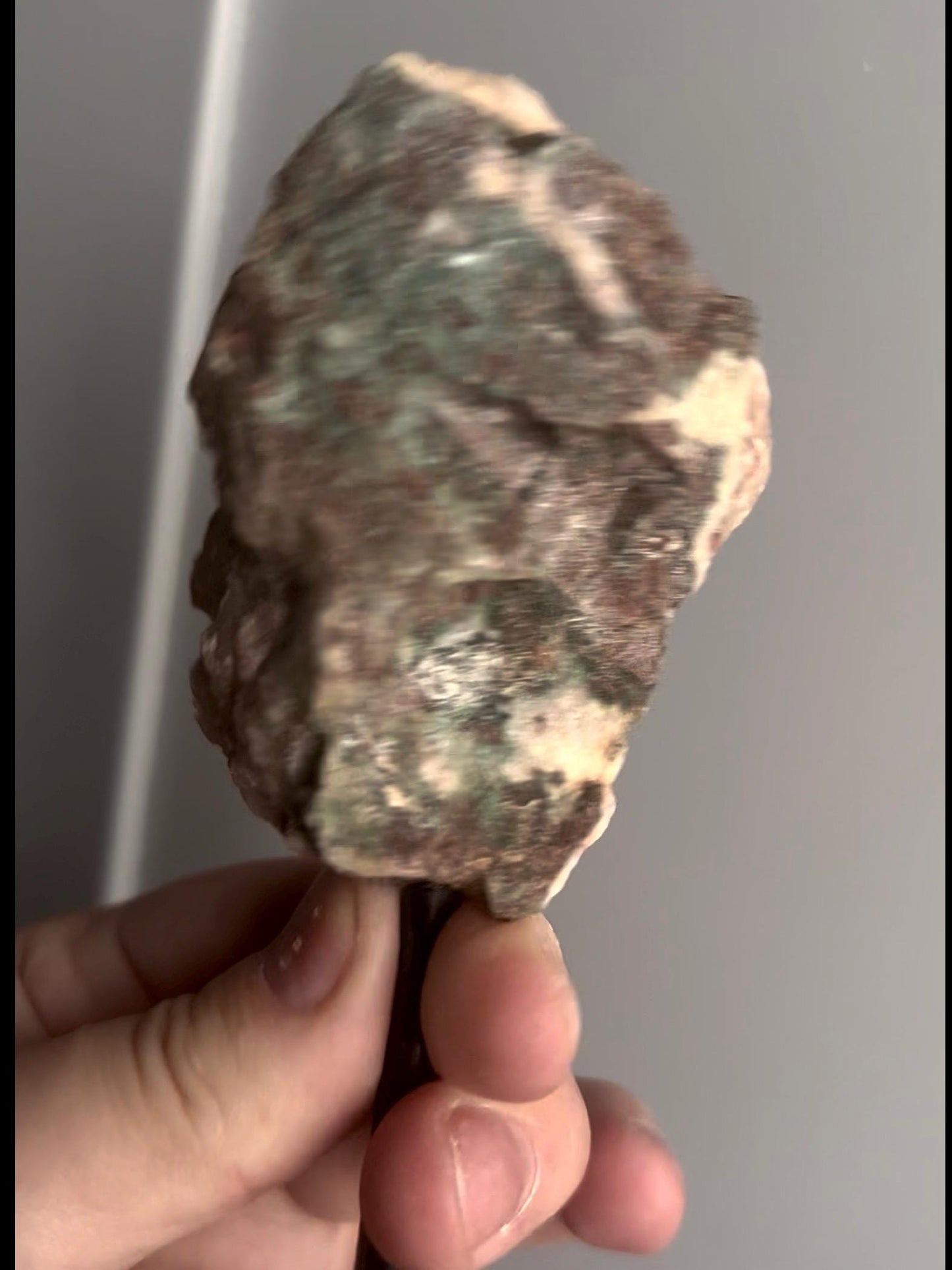 Red pink amethyst geode on stand