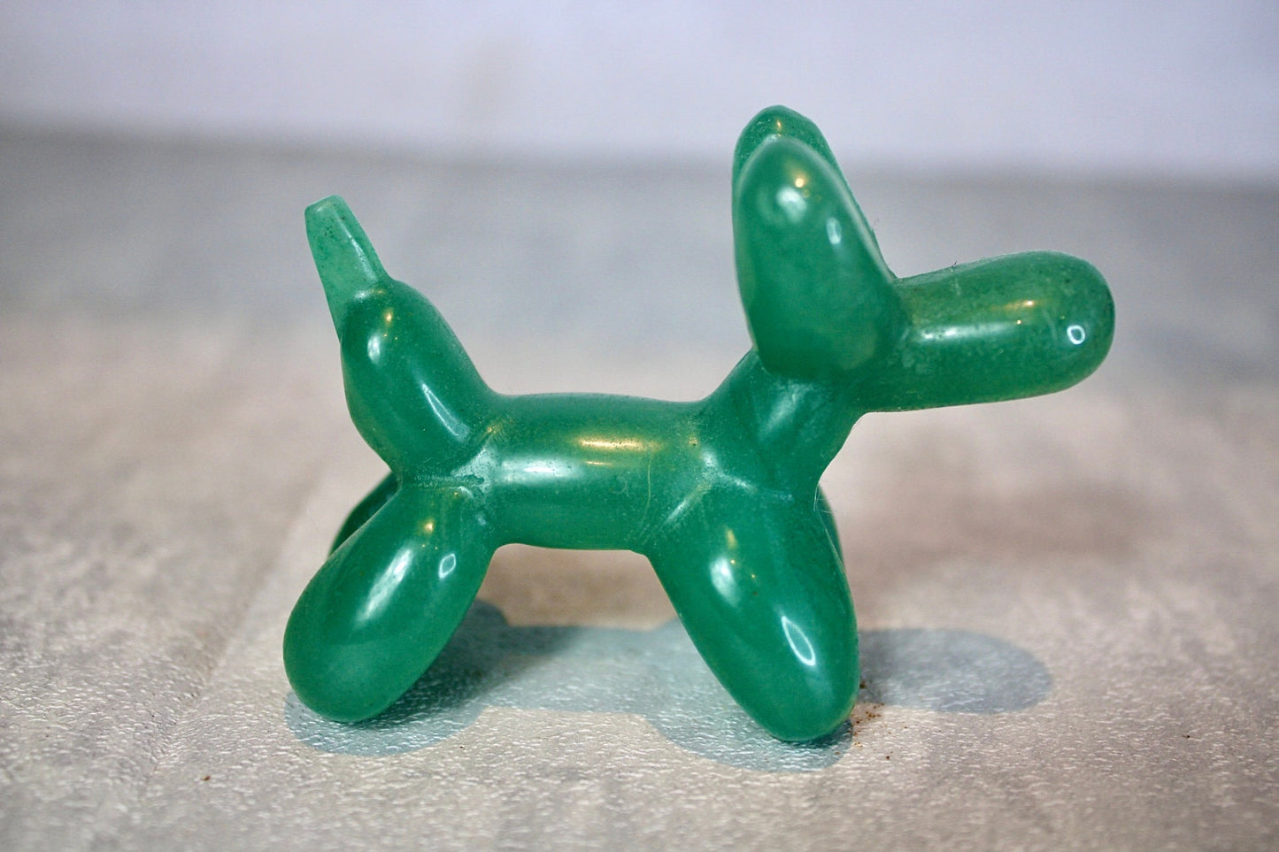 Green, strawberry quartz, balloon dog, carving 5.5 (h) 8cm (L)
