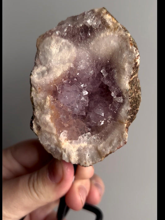 High grade, pink amethyst geode on stand with purple druzy