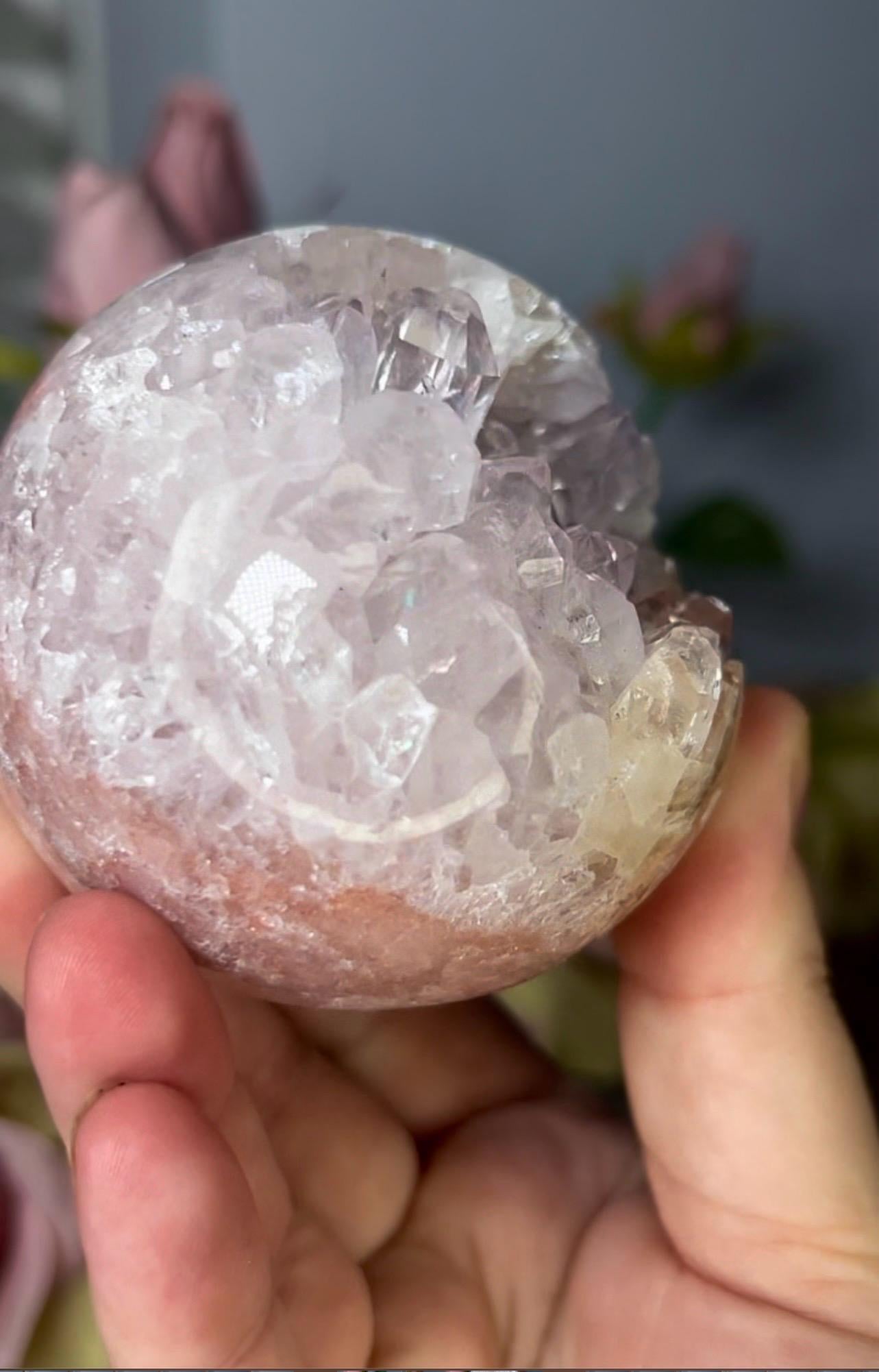 High grade, pink amethyst sphere with high clarity, rainbow, quartz teeth 429g