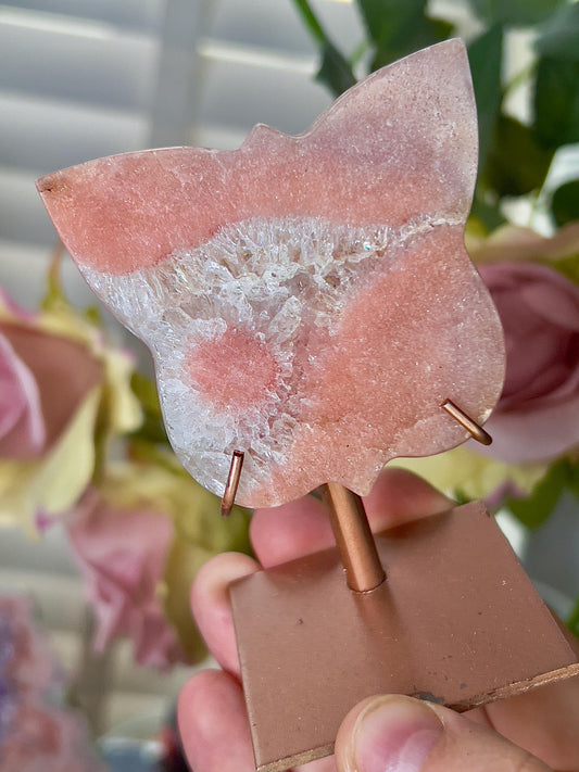 Pink amethyst butterfly in a peach tone with flower on stand