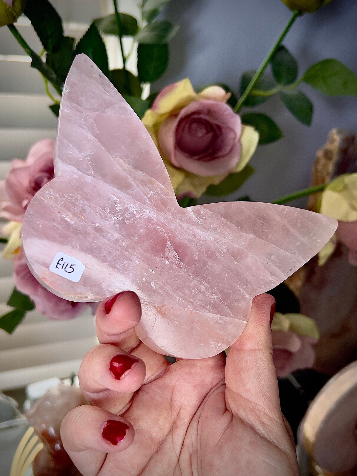 High grade, rose quartz butterfly with gold pedestal stand
