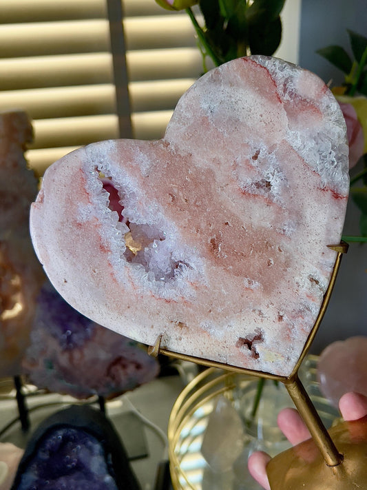 High quality, peach toned, pink amethyst heart with high drape quartz & red hematite lining on a custom gold stand 1.274kg