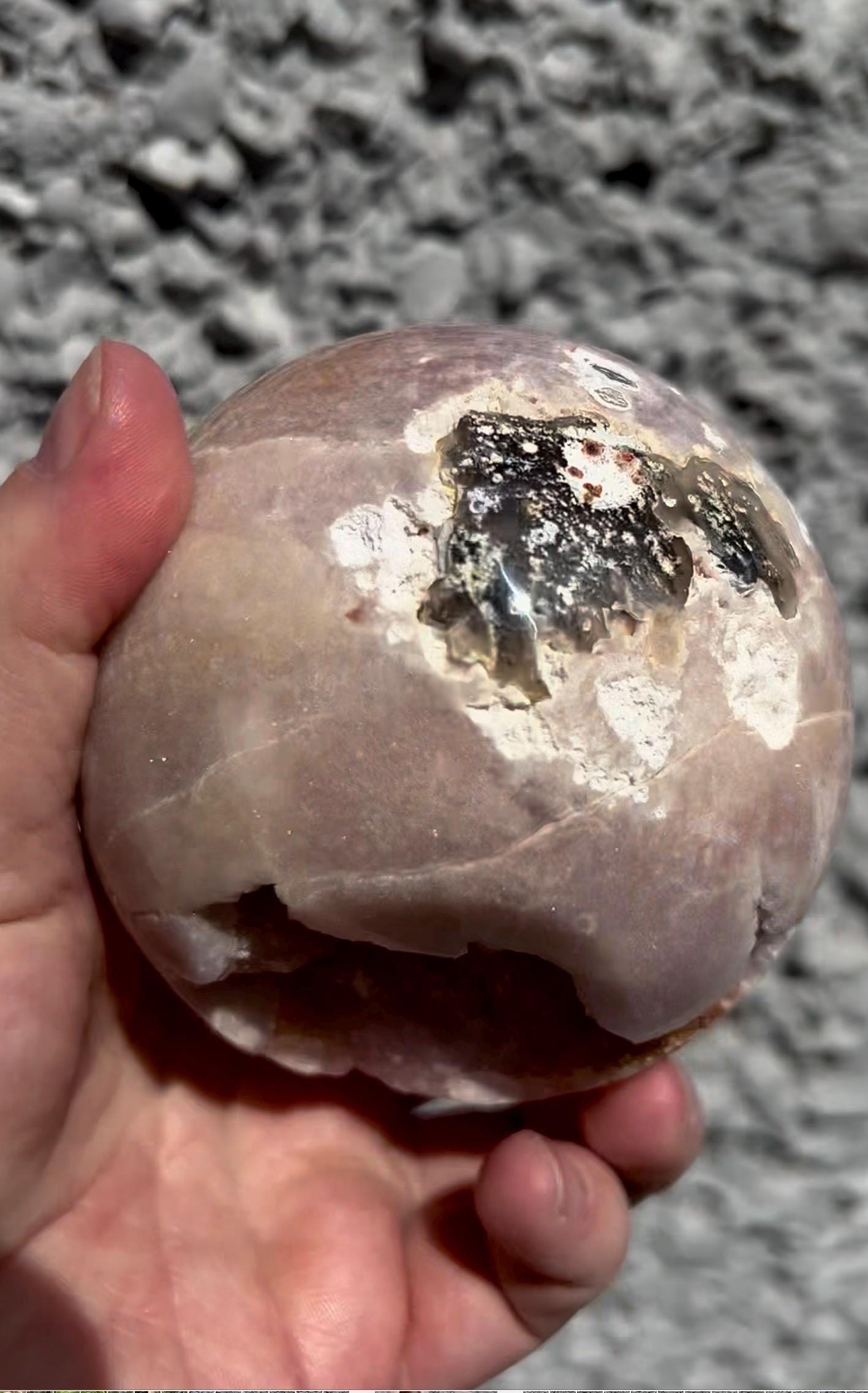 large, perfect baby pink amethyst sphere with sugar druzy cave and jasper 895g