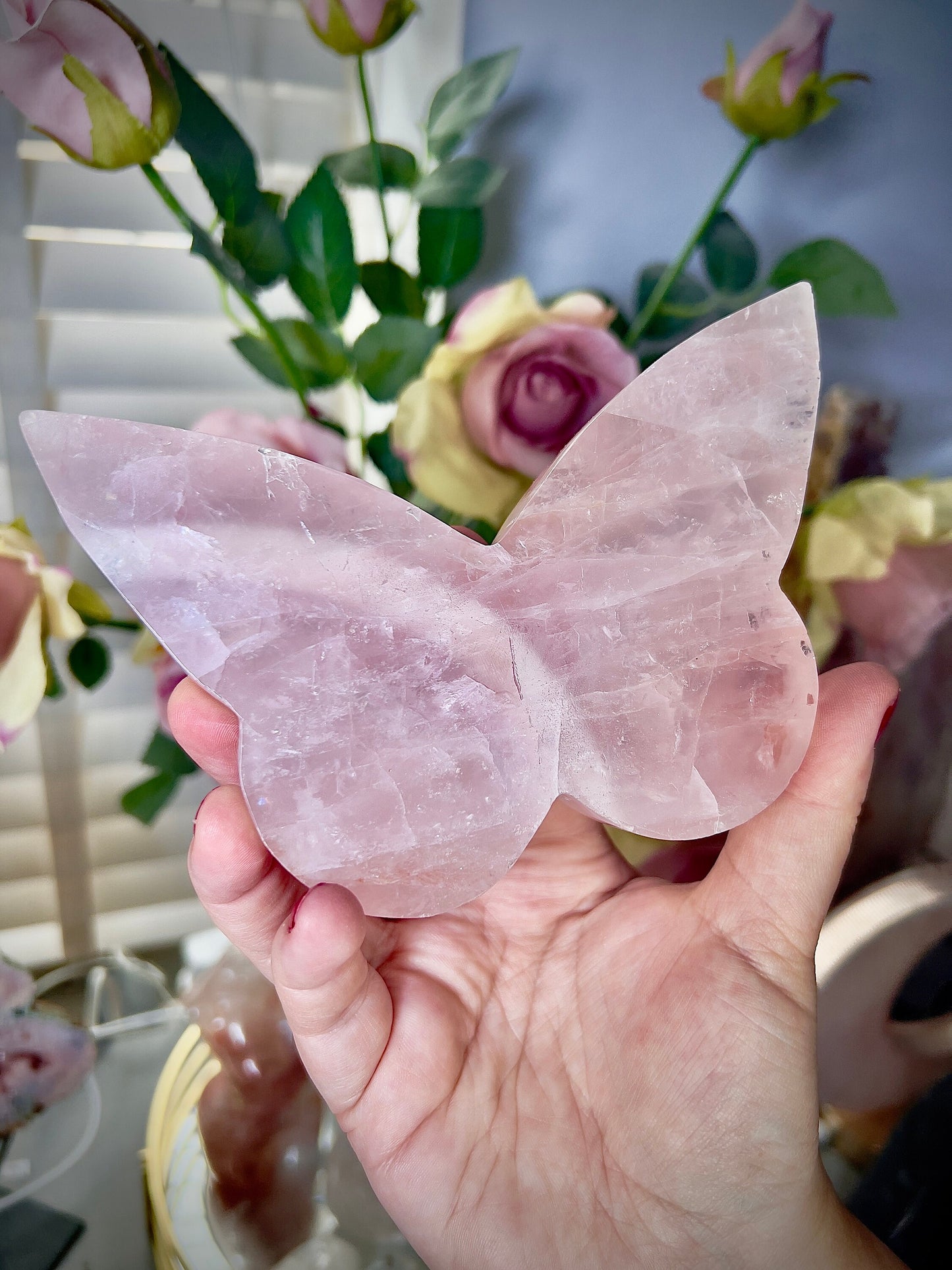 High grade, rose quartz butterfly with gold pedestal stand