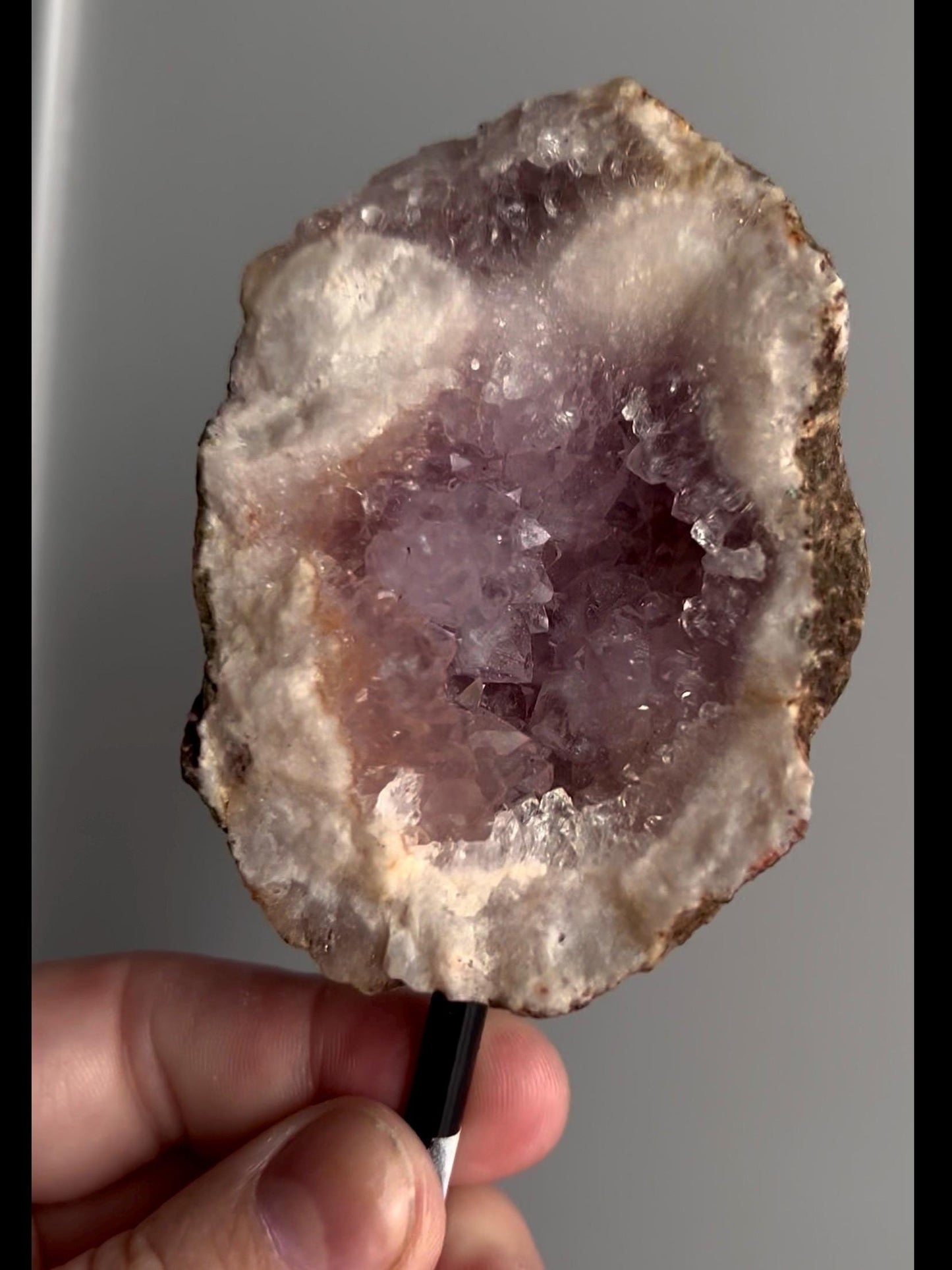High grade, pink amethyst geode on stand with purple druzy