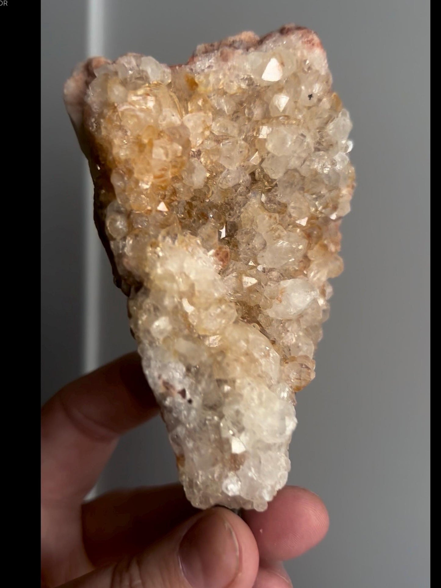 High grade, pink amethyst geode on stand with high clarity quartz teeth