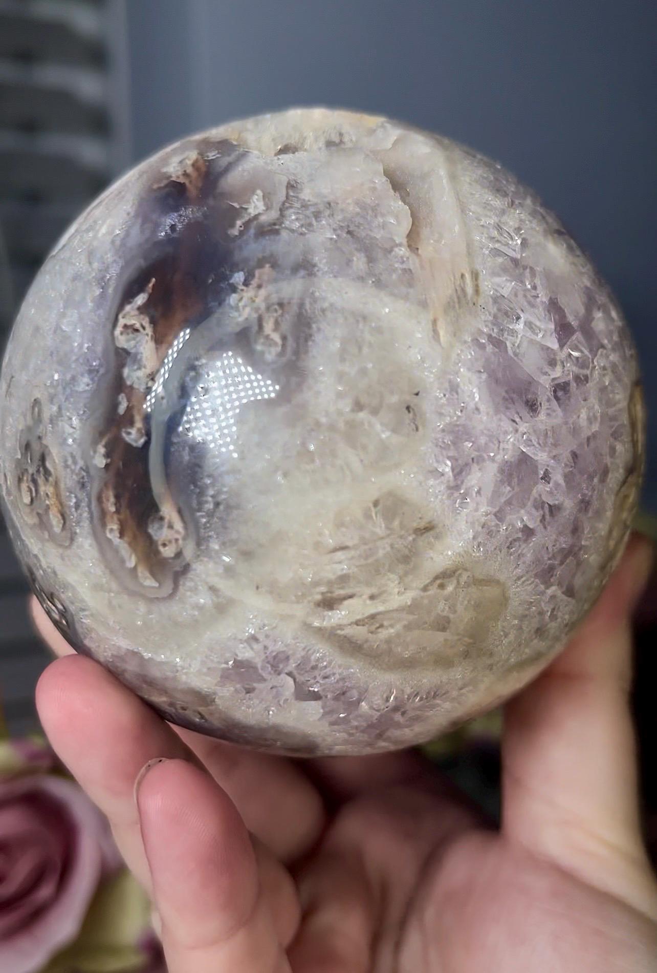 large, statement pink amethyst sphere with rutile formations and agate byover 1.220kg