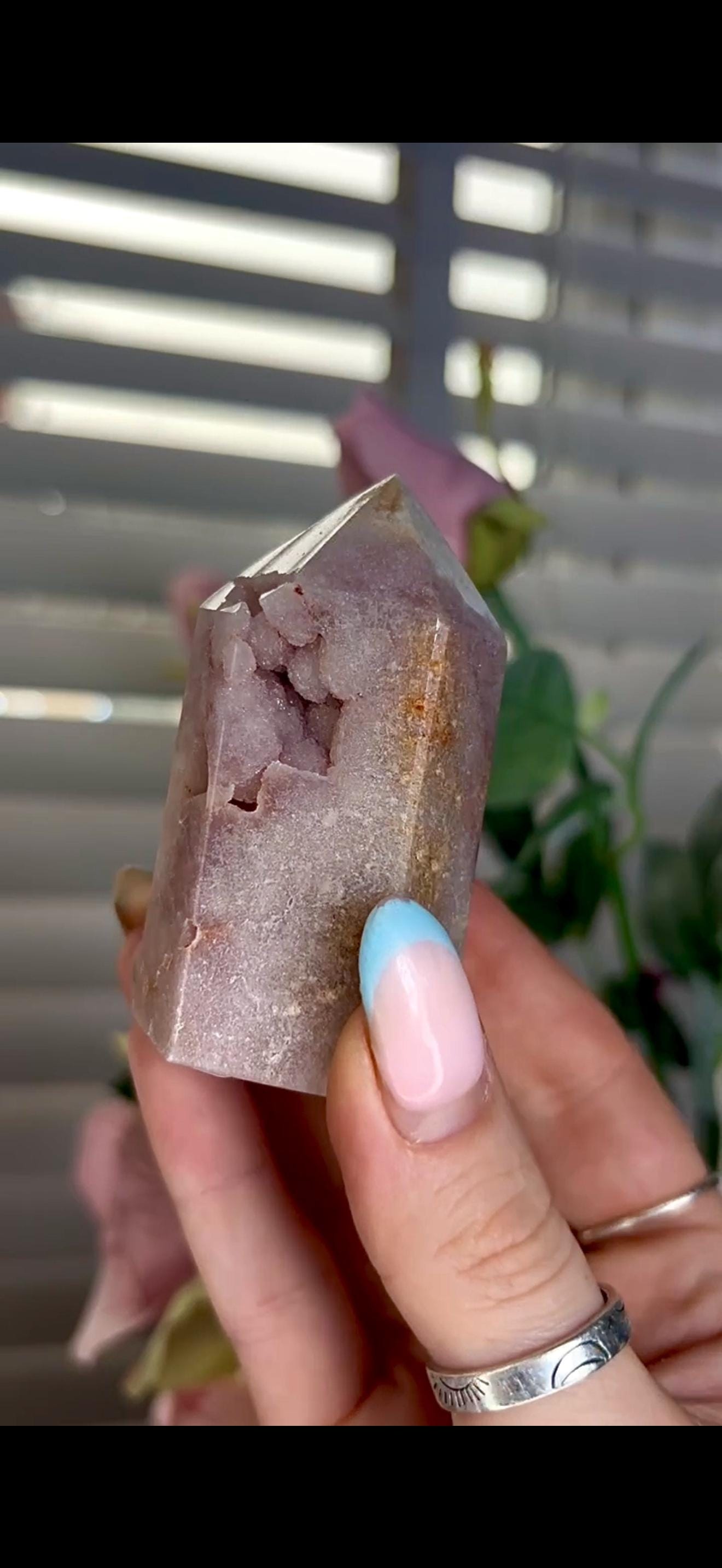 pink amethyst tower with bubble formation 128g 7cm by 4cm