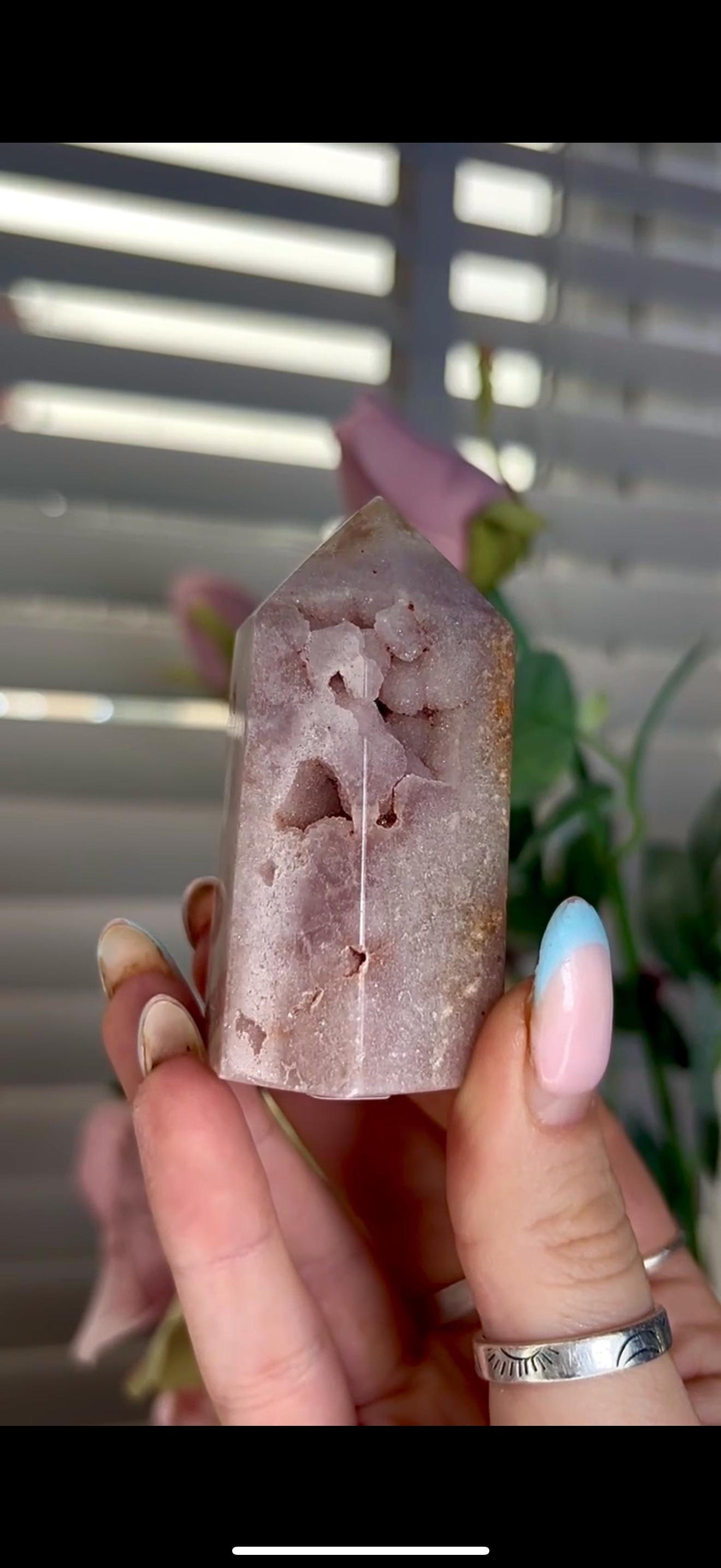 pink amethyst tower with bubble formation 128g 7cm by 4cm