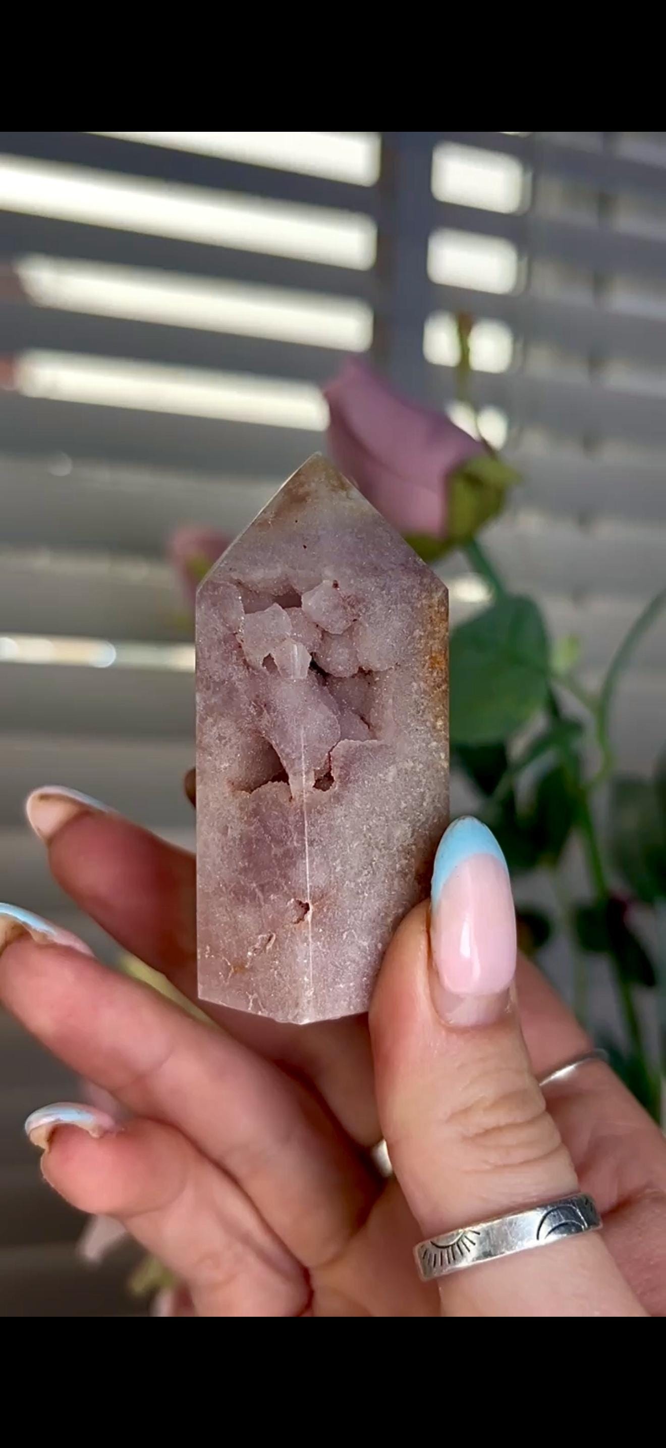 pink amethyst tower with bubble formation 128g 7cm by 4cm