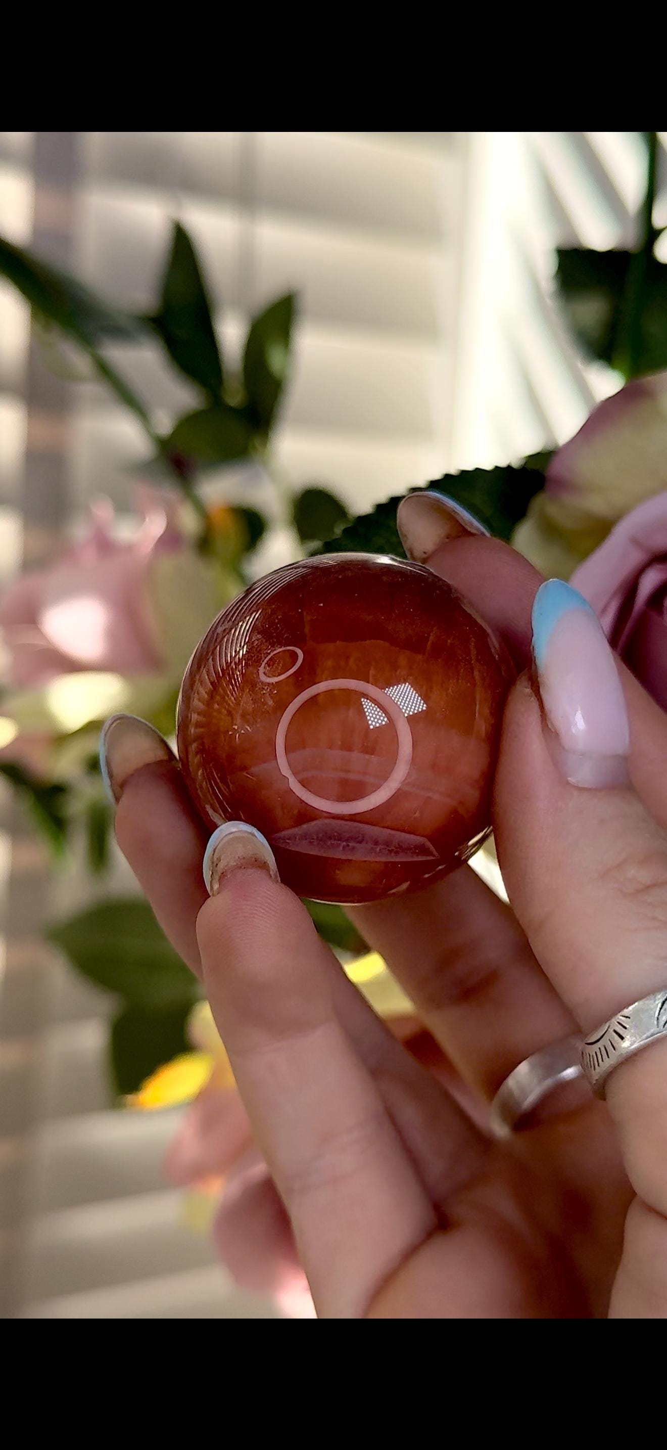 High quality, small red agate, carnelian sphere in orange/red tones