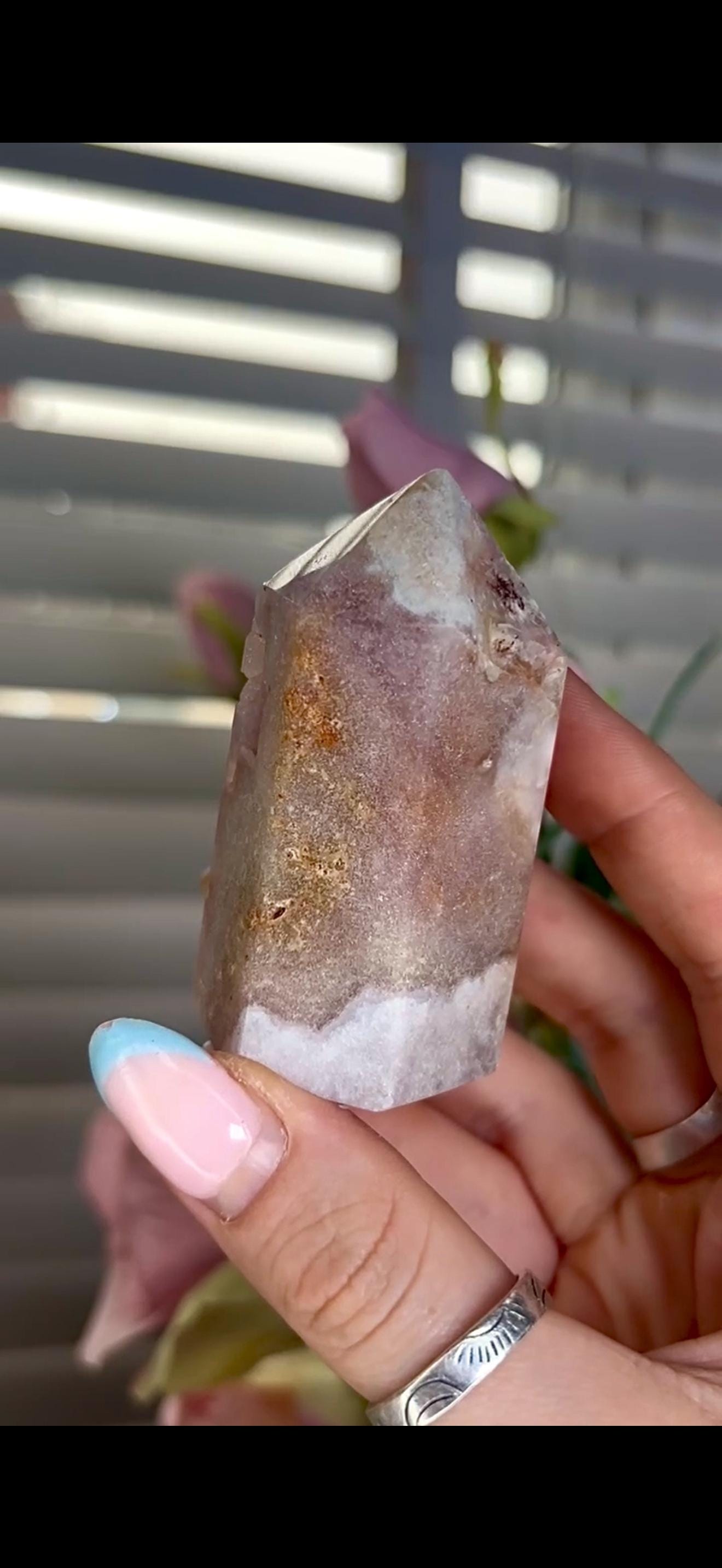 pink amethyst tower with bubble formation 128g 7cm by 4cm