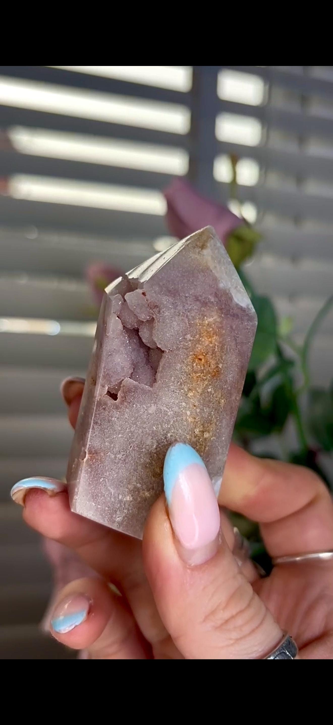 pink amethyst tower with bubble formation 128g 7cm by 4cm