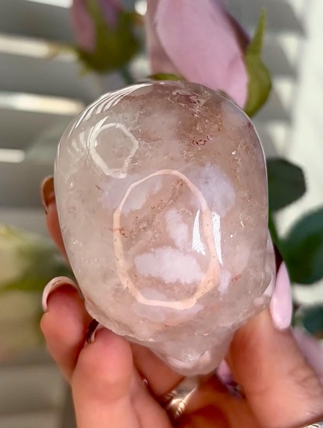 Flower agate skull in pink tones with red hematite lines