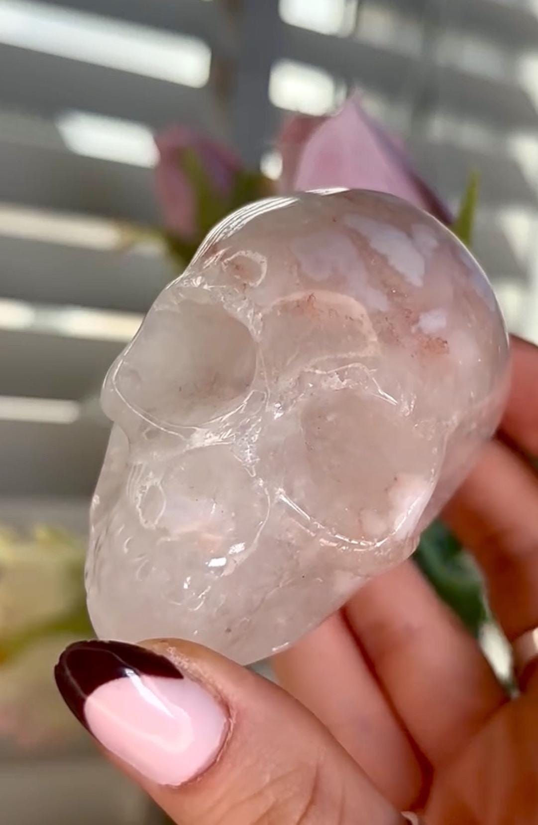 Flower agate skull in pink tones with red hematite lines