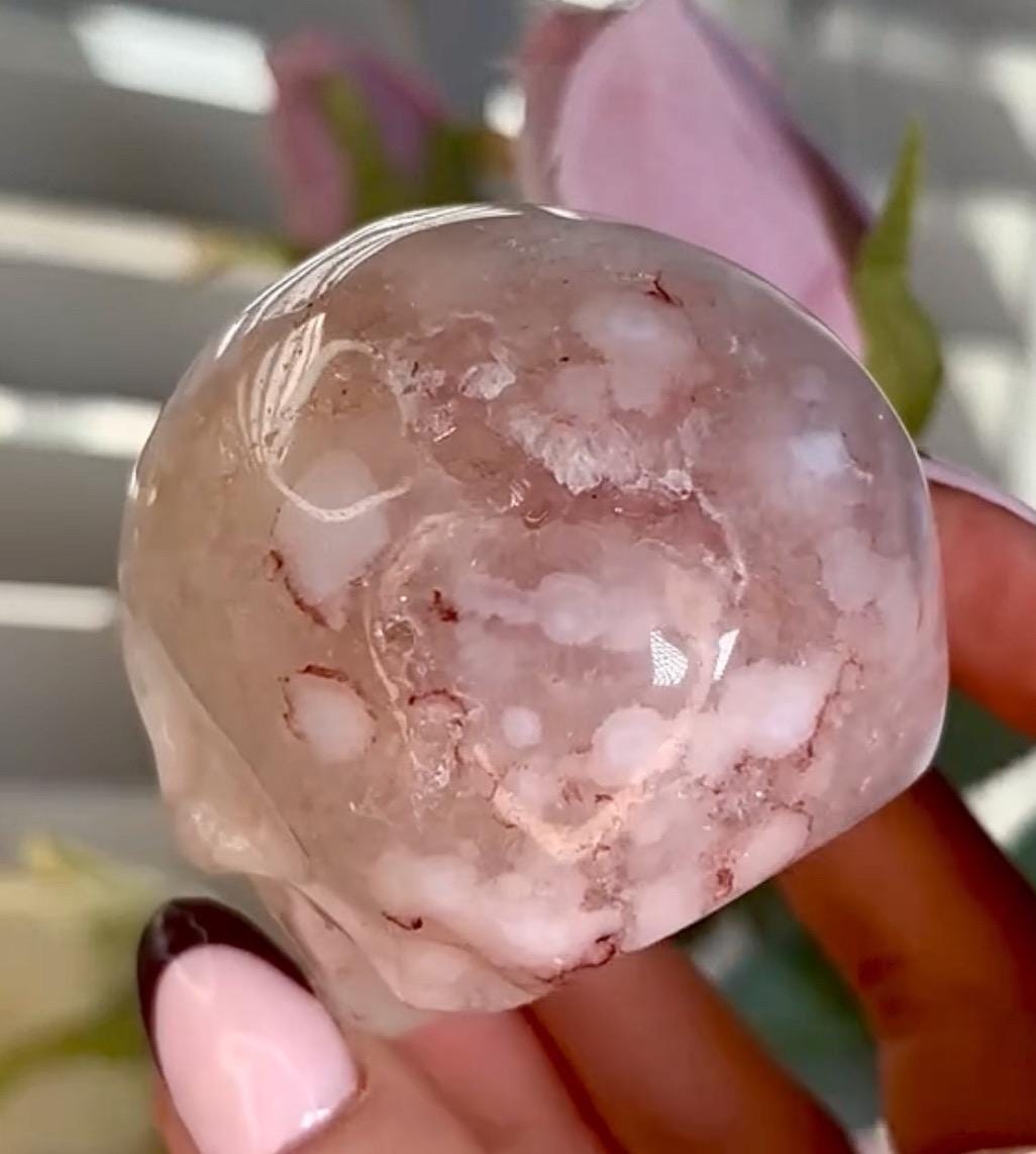 Flower agate skull in pink tones with red hematite lines
