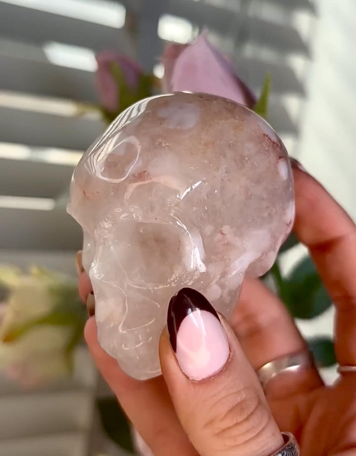 Flower agate skull in pink tones with red hematite lines