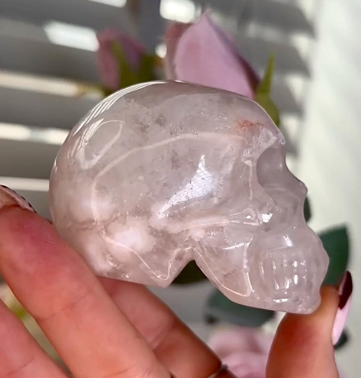 Flower agate skull in pink tones with red hematite lines