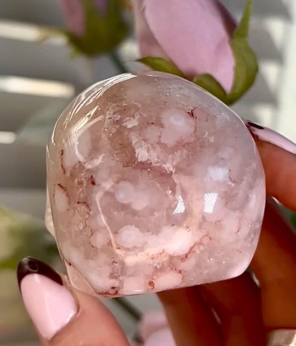 Flower agate skull in pink tones with red hematite lines