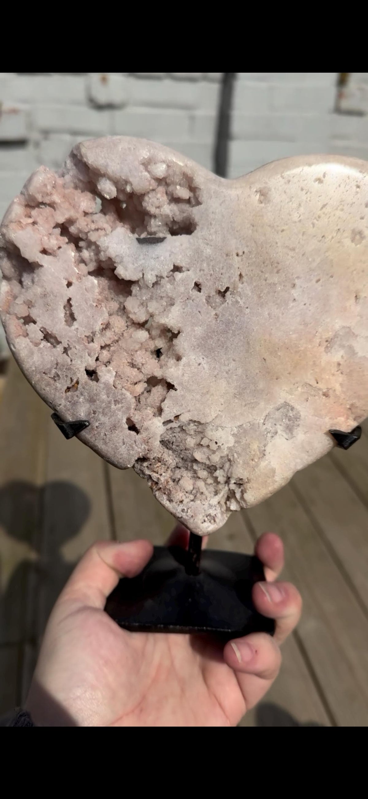 high quality, statement pink amethyst heart with unique bubble formations in a lemon/white tone - comes with a custom stand