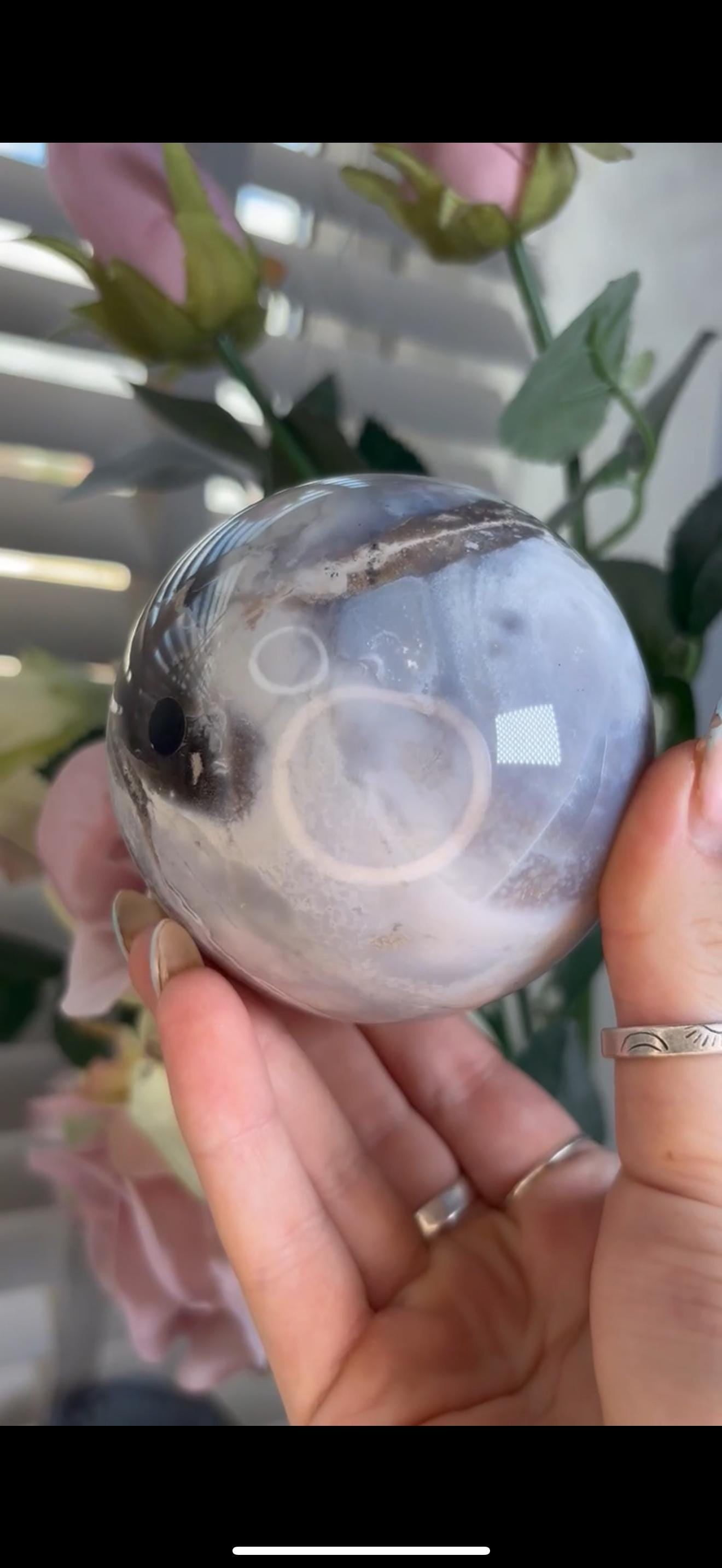 Pastel ocean jasper sphere in baby blue, white & dark blue tones with quartz