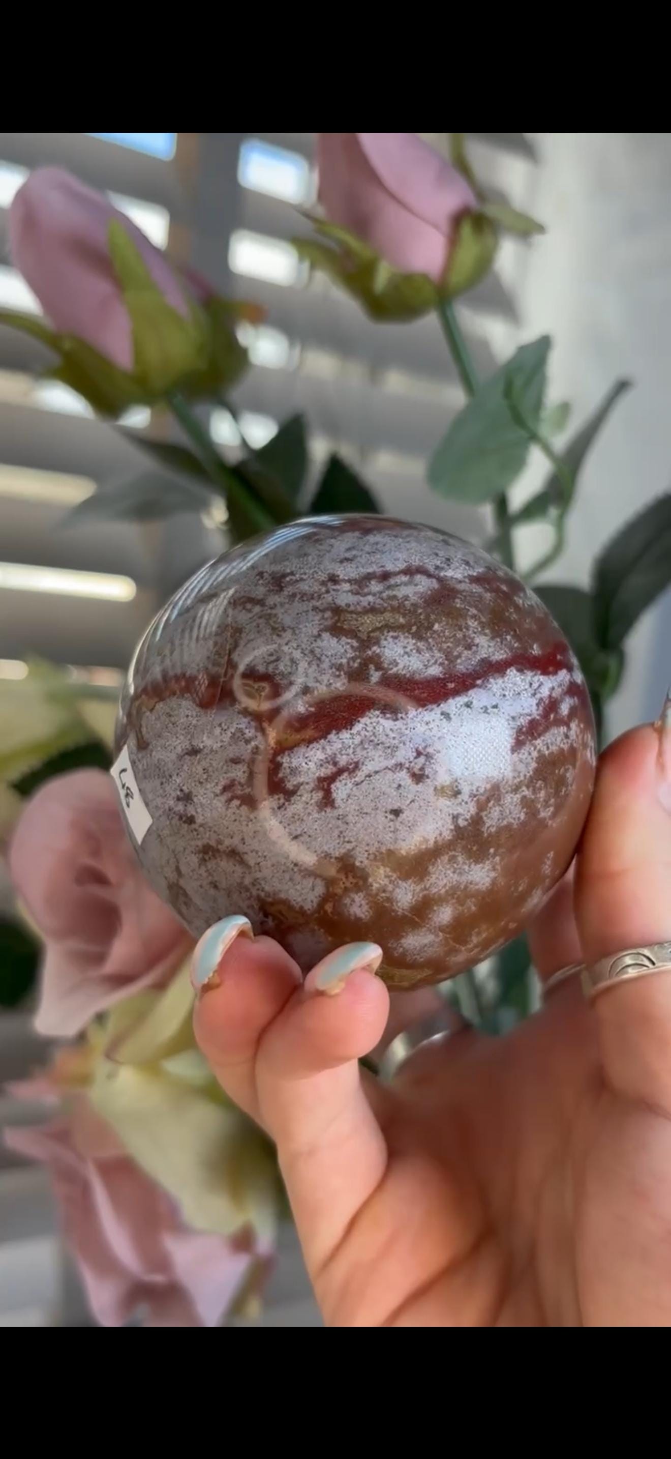ocean jasper sphere in red/pink & white tones