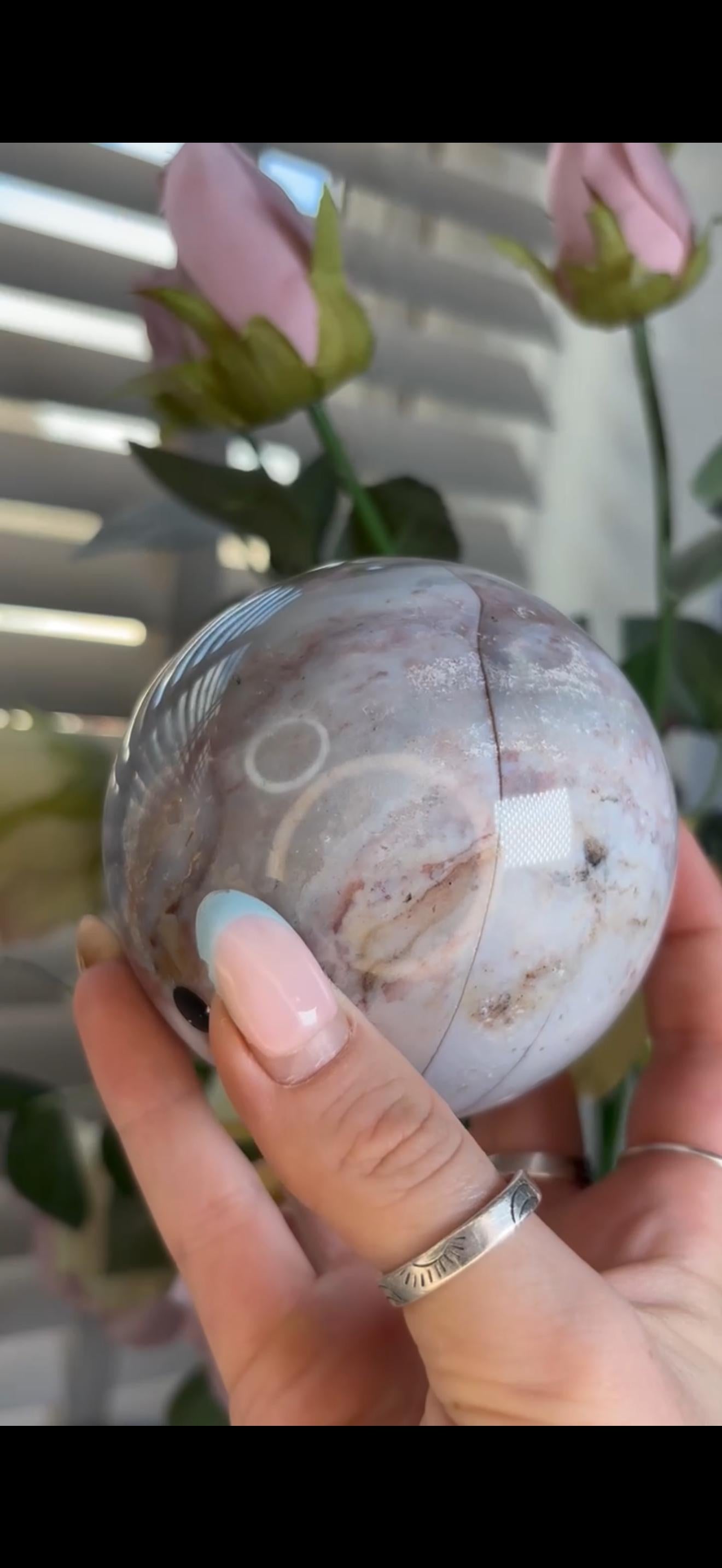 Pastel ocean jasper sphere in blue, pink & grey tones with some rough