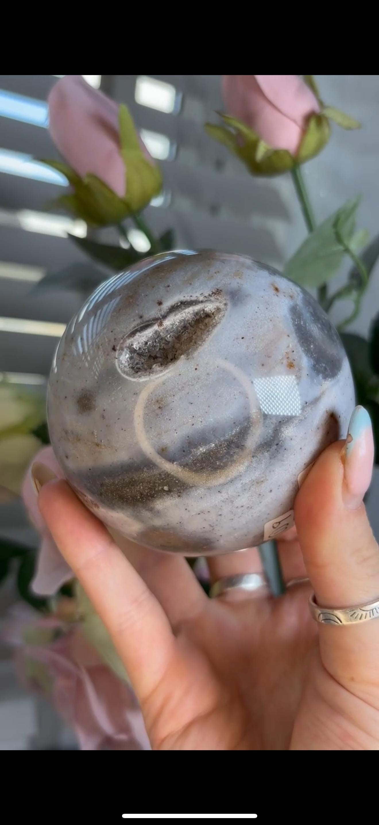 Pastel ocean jasper sphere in baby blue & grey tones with some druzy