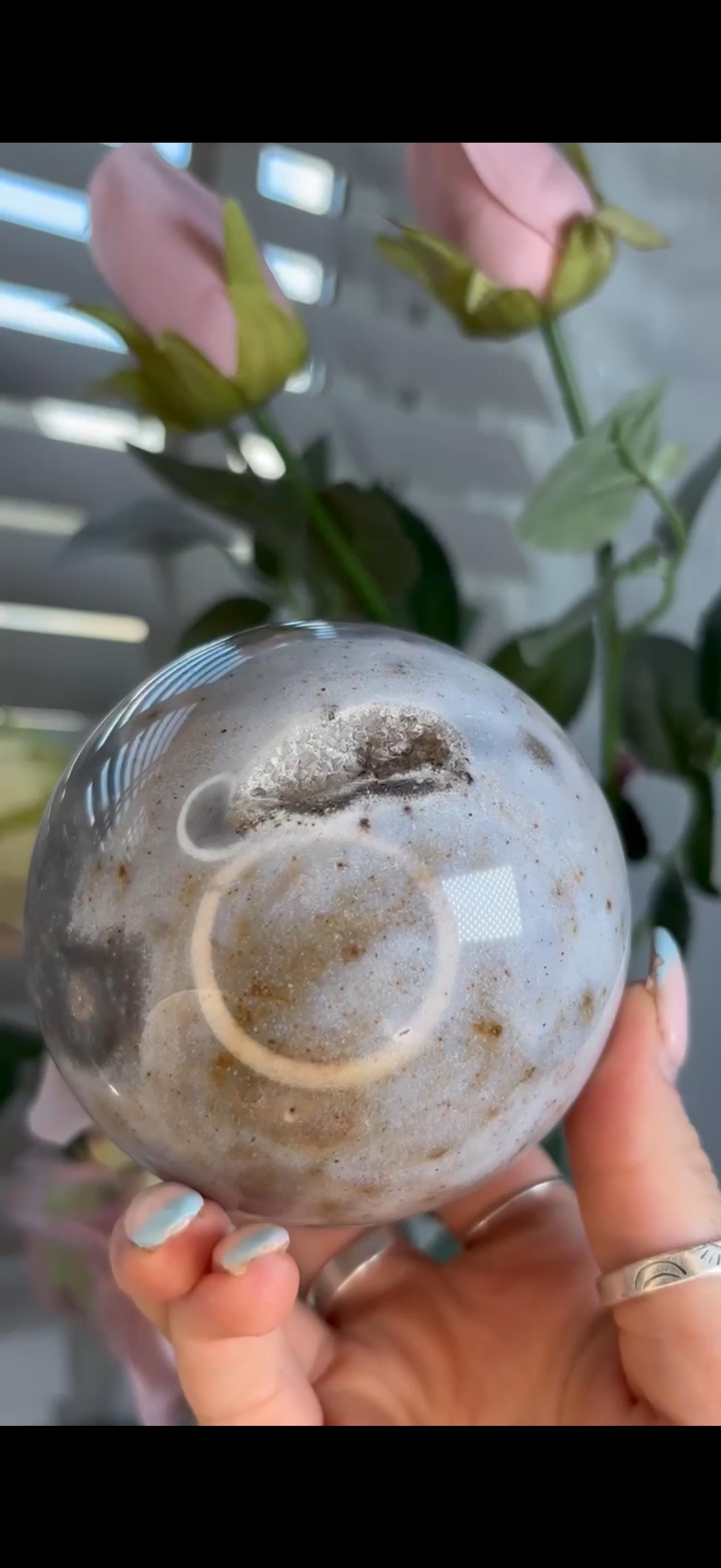Pastel ocean jasper sphere in baby blue & grey tones with some druzy