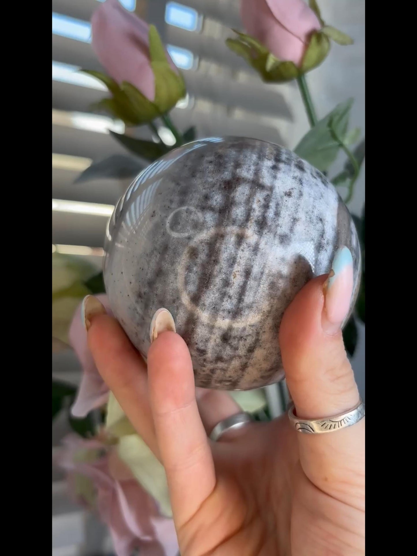 Pastel ocean jasper sphere in blue & grey tones with banding