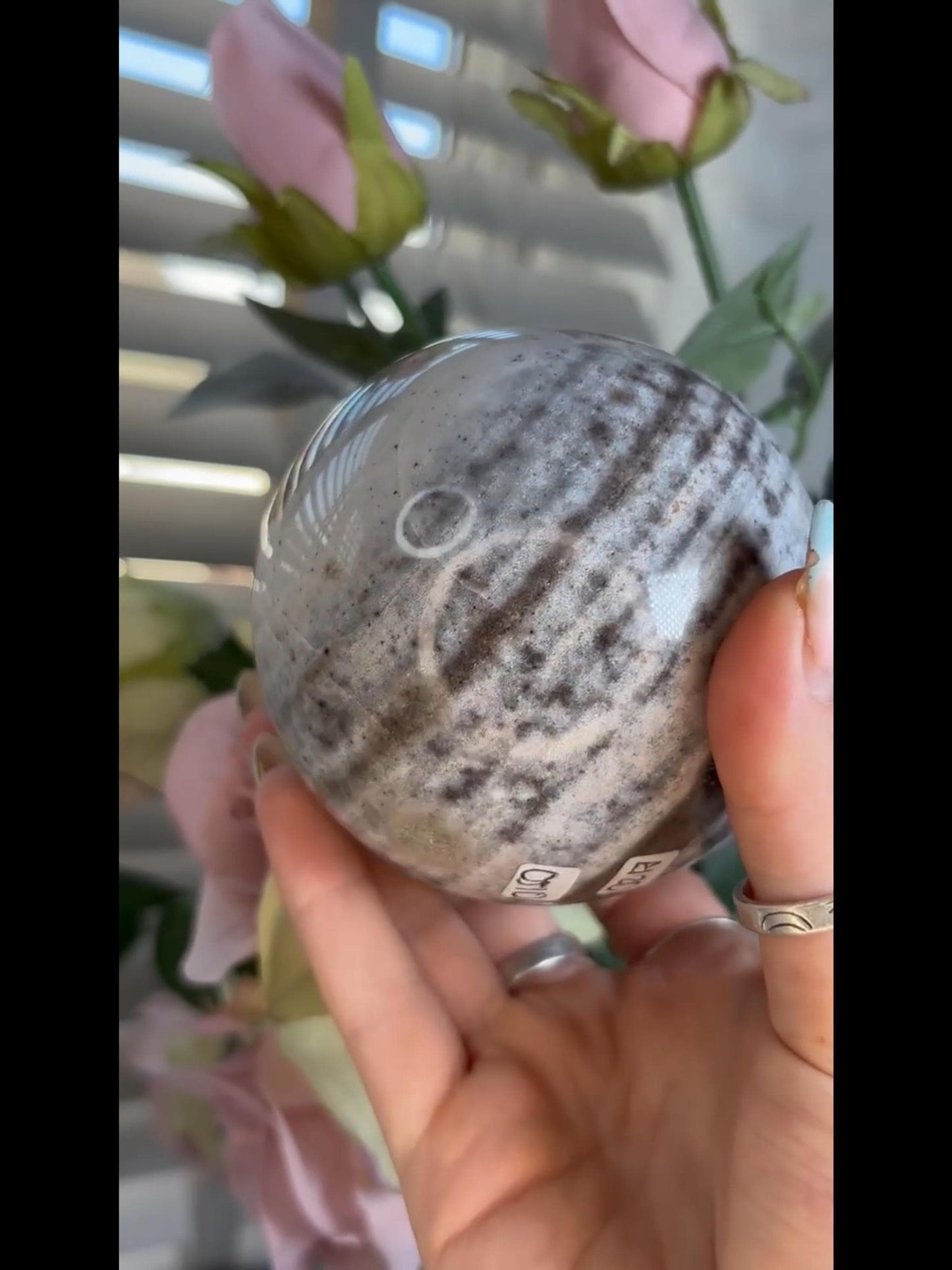Pastel ocean jasper sphere in blue & grey tones with banding