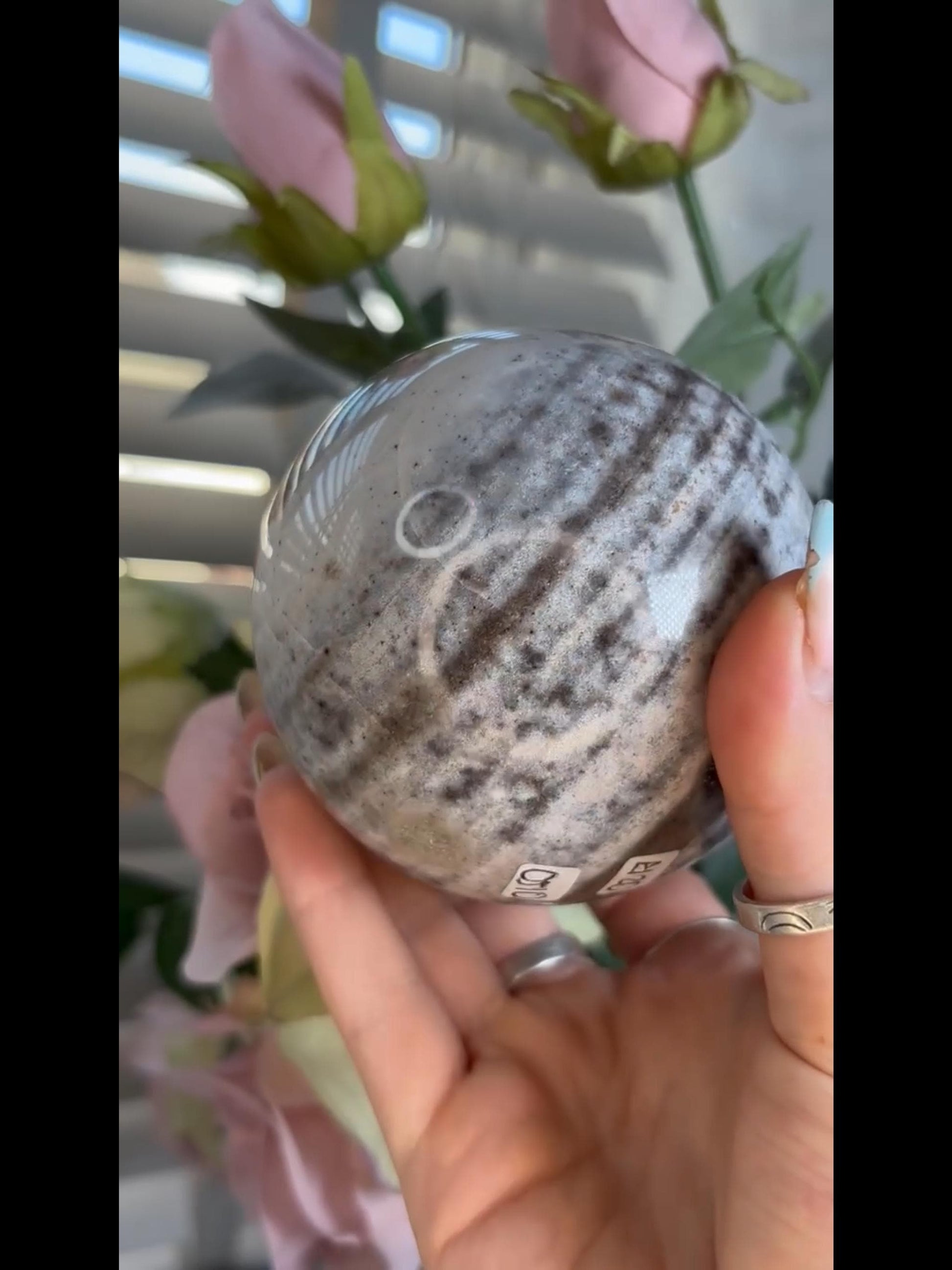Pastel ocean jasper sphere in blue & grey tones with banding