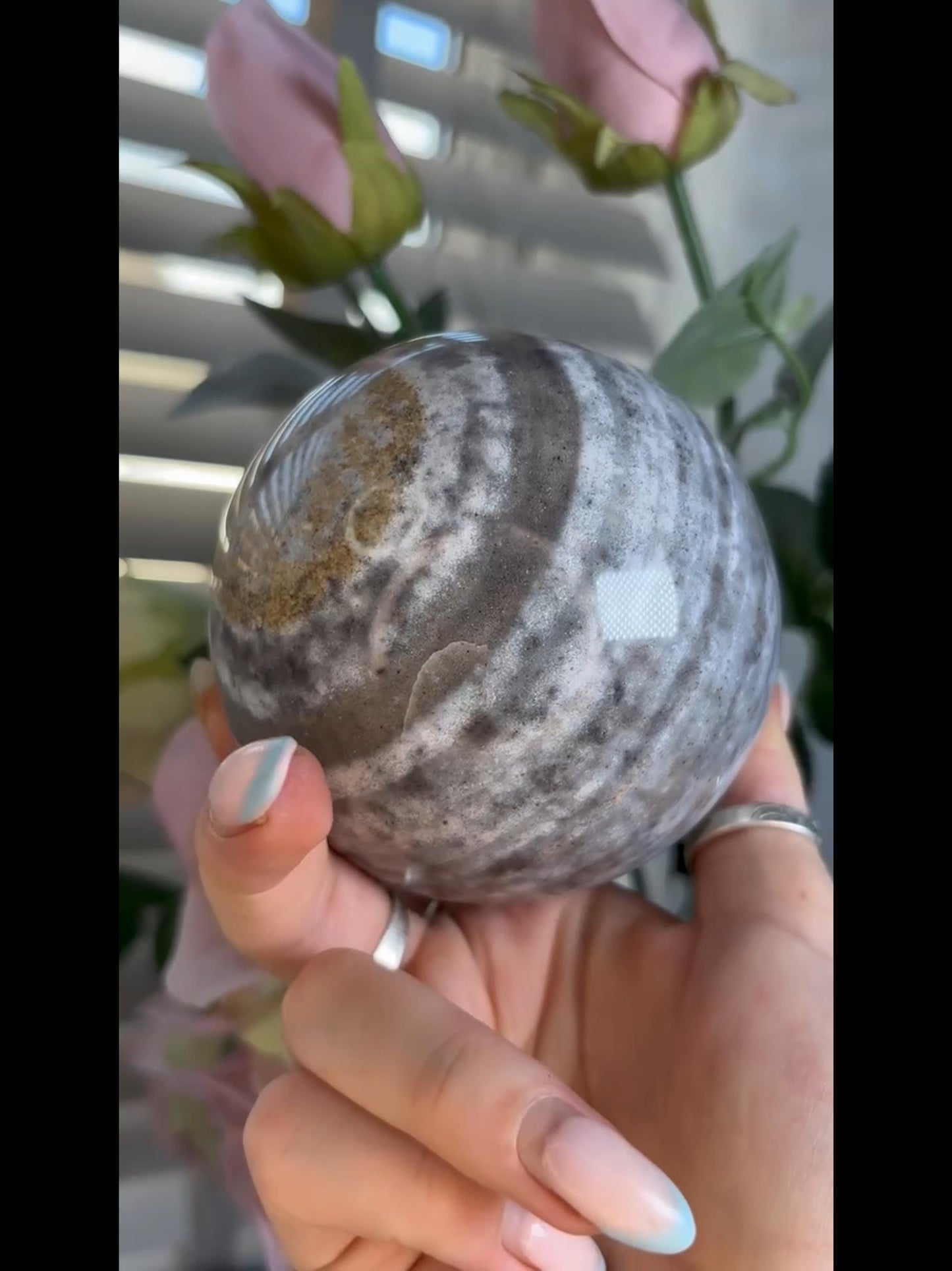 Pastel ocean jasper sphere in blue & grey tones with banding