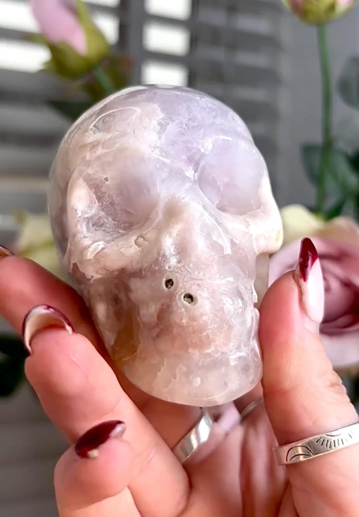 Flower agate skull in pink & blue tones