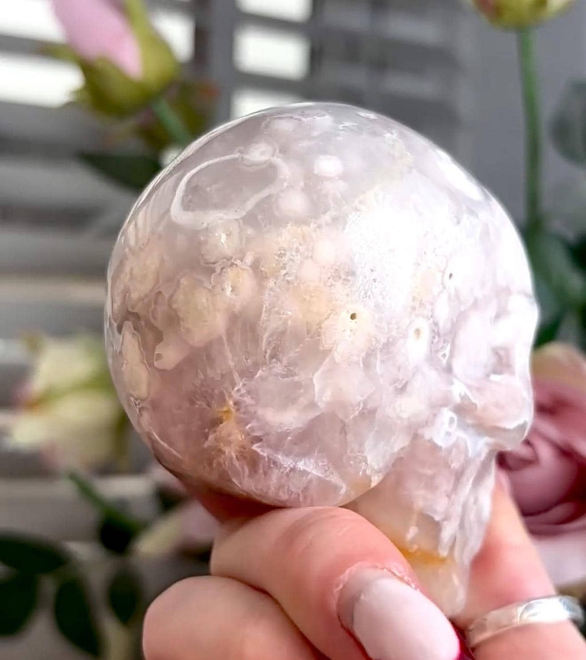 Flower agate skull in pink & blue tones