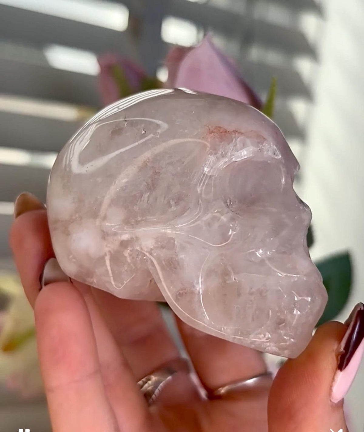 Flower agate skull in pink tones with red hematite lines