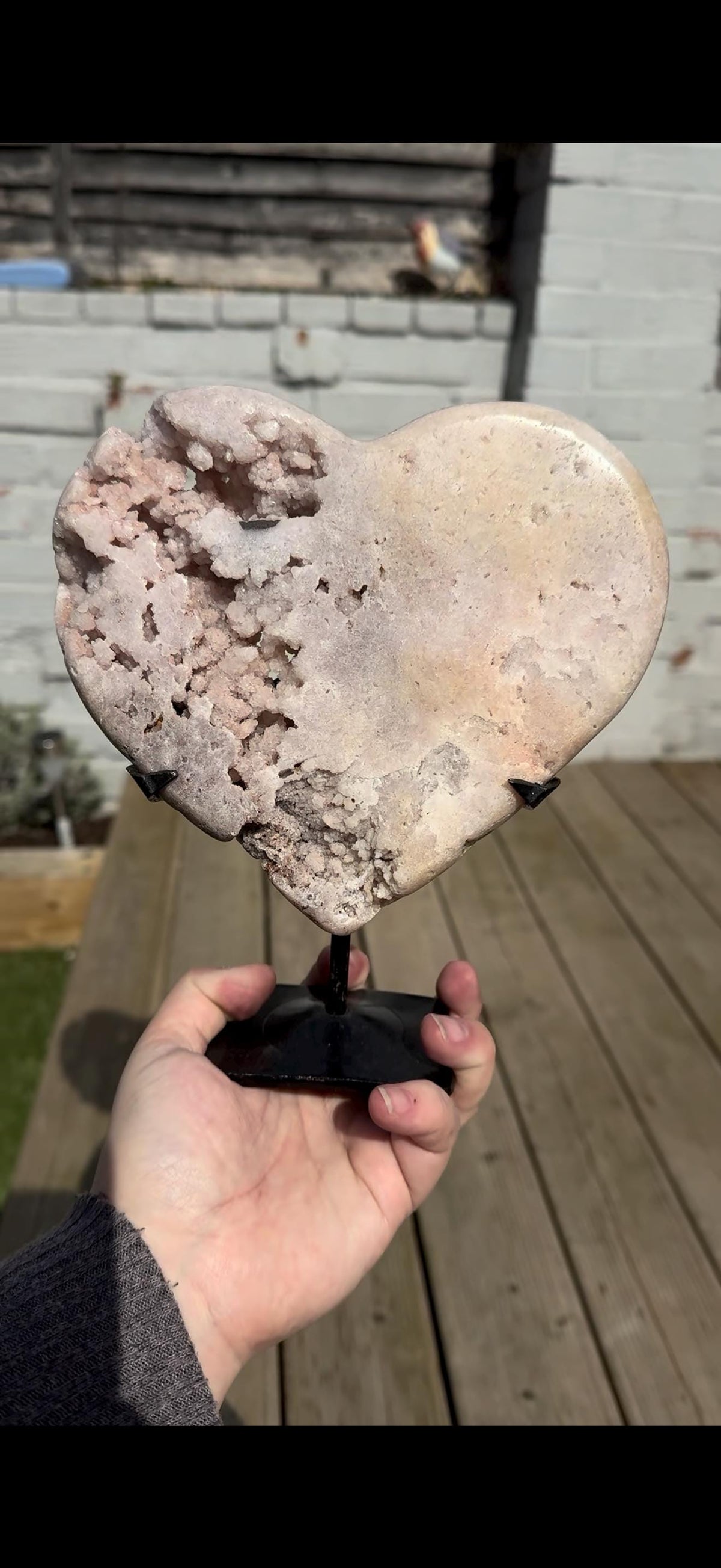 high quality, statement pink amethyst heart with unique bubble formations in a lemon/white tone - comes with a custom stand
