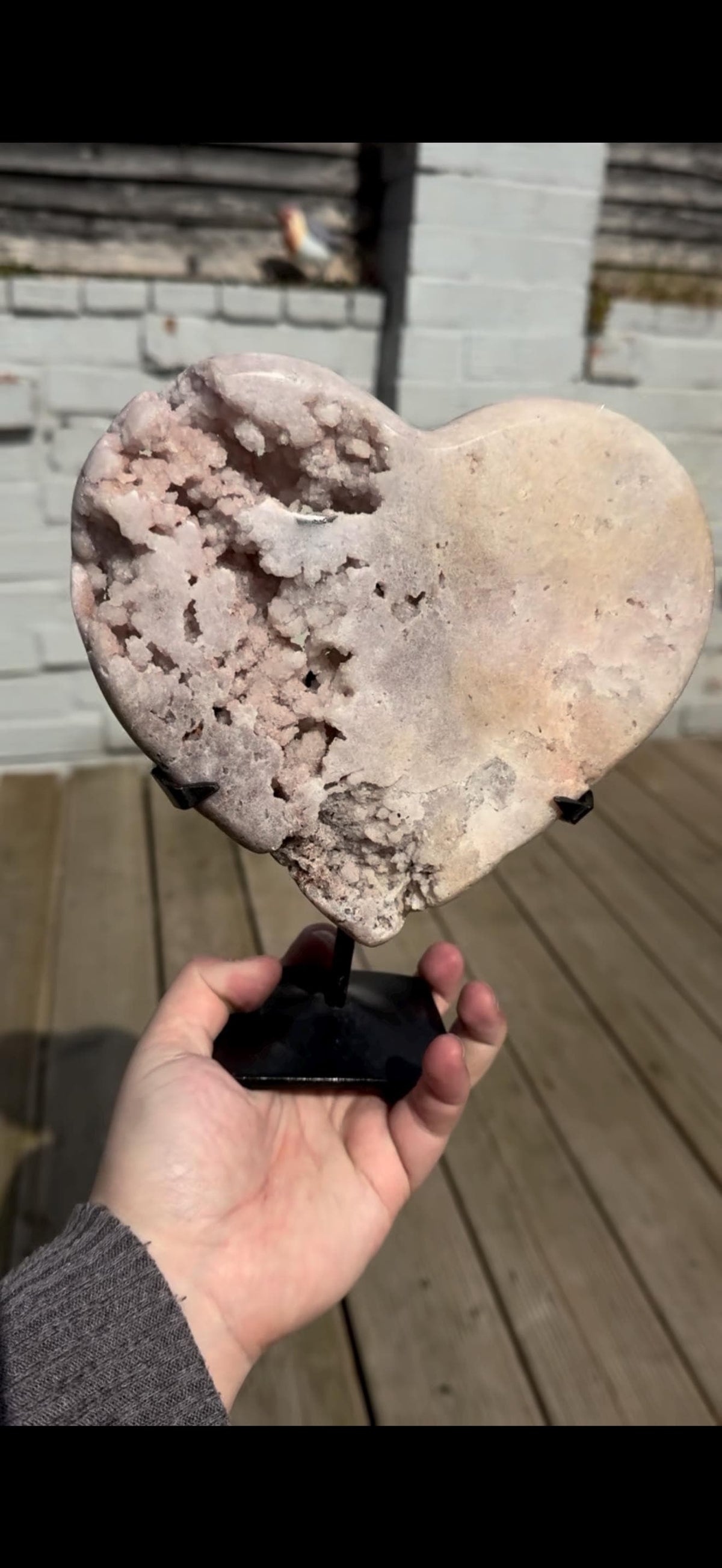high quality, statement pink amethyst heart with unique bubble formations in a lemon/white tone - comes with a custom stand