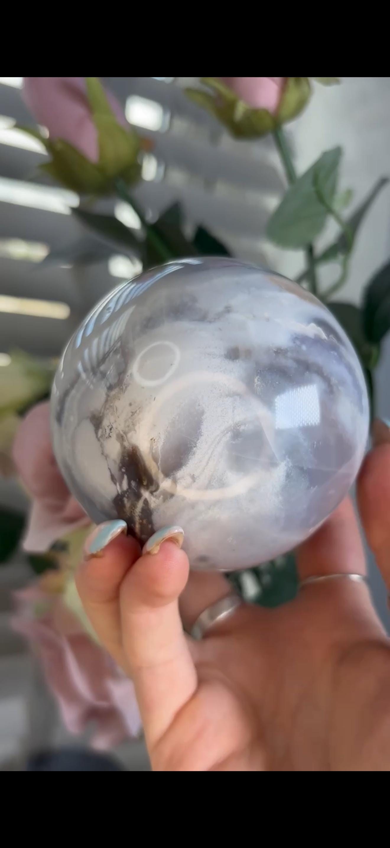 Pastel ocean jasper sphere in baby blue, white & dark blue tones with quartz