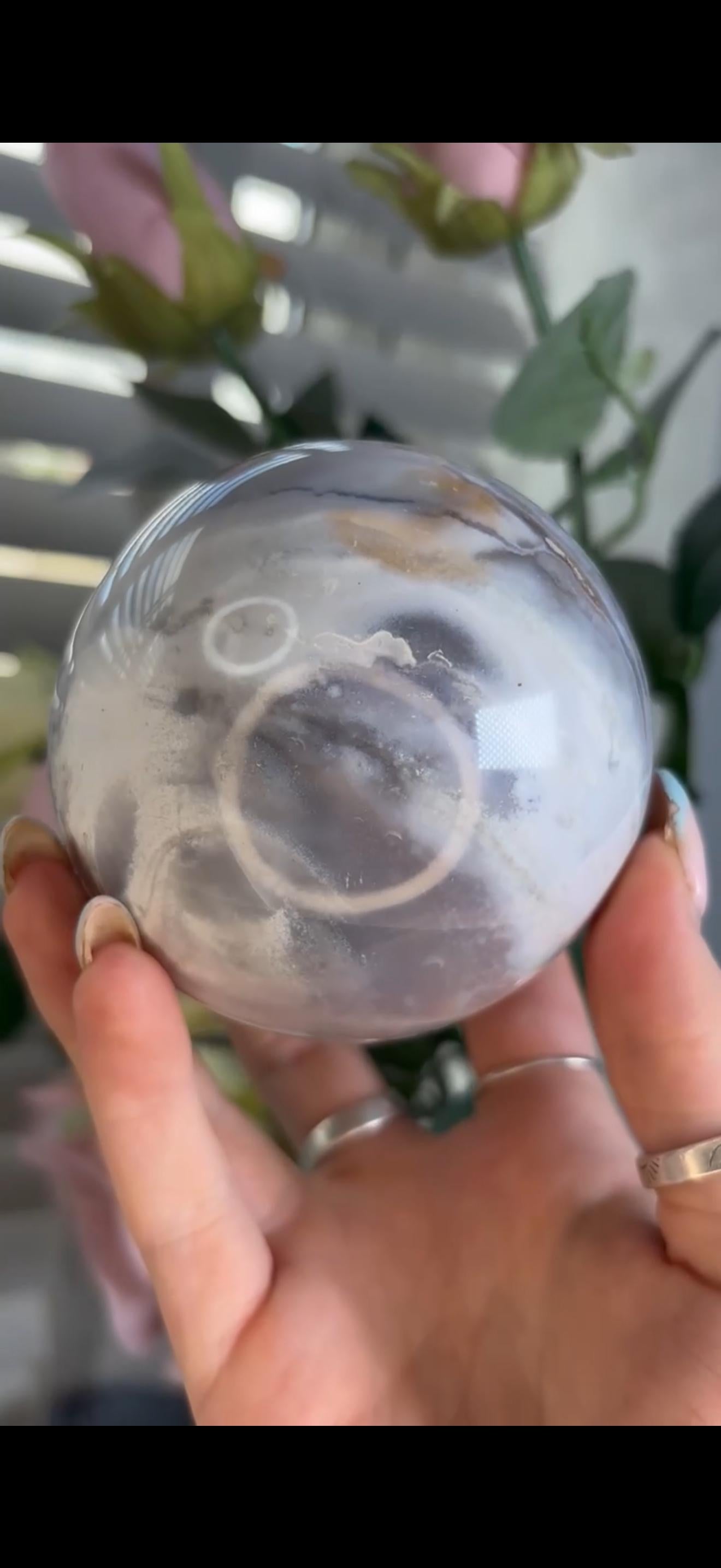Pastel ocean jasper sphere in baby blue, white & dark blue tones with quartz