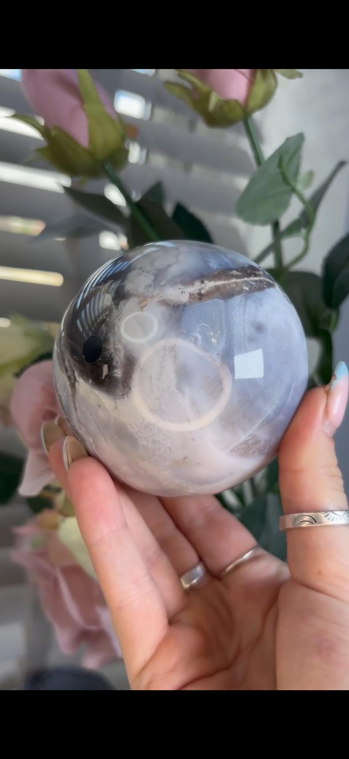 Pastel ocean jasper sphere in baby blue, white & dark blue tones with quartz